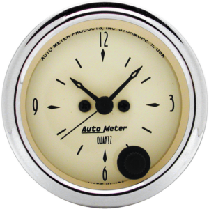 1885 Auto Meter Antique Beige 2 1/16" Quartz Clock 12 volt or 16 volt